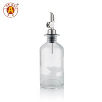 Bouteille en verre cristal élégante de 500 ml avec bouchon à vis et pompe noire pour huile d'olive, pots ambrés pour aliments avec couvercles, vente directe usine