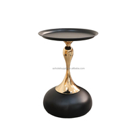 Table basse moderne de luxe en métal noir et or, écologique et durable, pour salon et hall d'hôtel