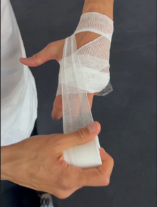 เทปพันมือสำหรับกีฬามวย 100% ผ้าฝ้ายพรีเมียม ยืดได้ 4 ทิศทาง สำหรับ MMA มวยไทย คิกบ็อกซิ่ง และกีฬาต่อสู้อื่นๆ - Product Image 4