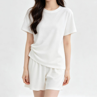Ensemble décontracté deux pièces en coton pour femme, coupe ample, t-shirt et short, idéal pour l'été et le quotidien, personnalisable avec logo, vente en gros