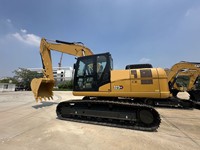 Excavatrice sur chenilles Relentless 323GX 22T 1,2 m³ pour travaux de terrassement routier, excavation de masse et creusement de grands fossés de fondation