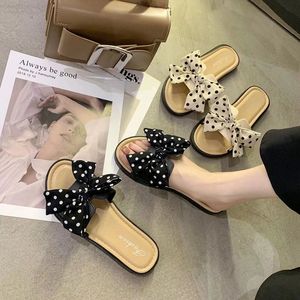 Sandali da spiaggia estivi all'aperto da <span class=keywords><strong>donna</strong></span> e infradito piatte nuove pantofole Slip personalizzate con fiocco con tendenza alla moda - Product Image 1