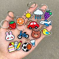 Porte-clés en acrylique personnalisés avec des motifs de cactus, de vie marine, d'espace, de bonbons, de lanternes, d'outils, de machine à écrire et de musique pour des cadeaux de collection uniques