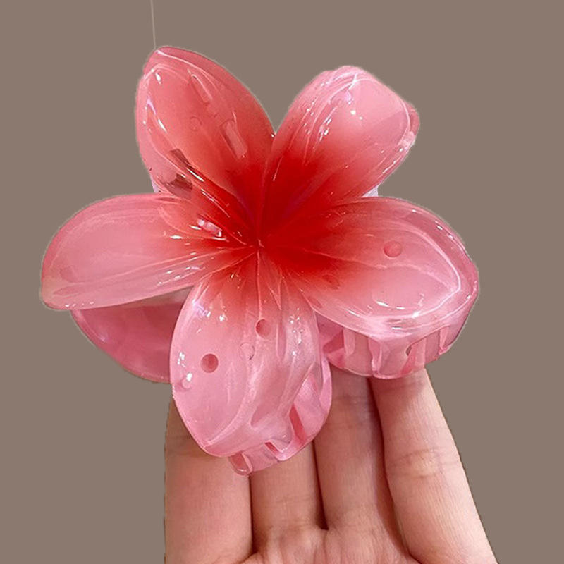 5 red frangipani clips