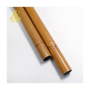 Grain de bois personnalisé 6066 6082 Profilé en aluminium de tuyau rond de style bambou CNC pour cadres architecturaux Robuste Léger - Product Image 1