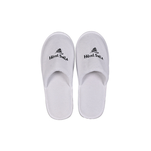 Nouveauté Chaussons d'hôtel jetables blancs en tissu de velours corail doux de luxe - Product Image 1