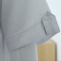 Uniforme médical unisexe blanc à col montant et manches courtes, design soigné et confortable, pour détection par détecteur de métaux, vente en gros, pour hôpitaux européens
