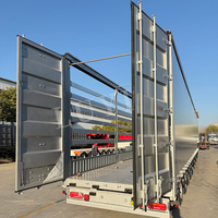 Semi-remorque à rideaux latéraux ouvrants 5 essieux haute capacité de charge 40 pieds en tissu PVC pour transport multimodal et alimentaire