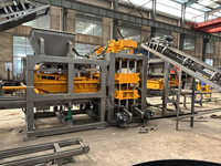 Machine à fabriquer des briques en béton entièrement automatique d'occasion QT12-15 avec PLC et pompe hydraulique haute pression, haute productivité