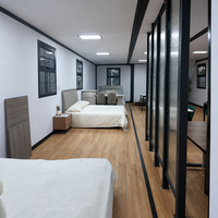 Villa préfabriquée modulaire de 40 pieds sur deux étages, conteneur habitable avec hauteur supplémentaire de 2,85 m et balcon pour hôtel-resort