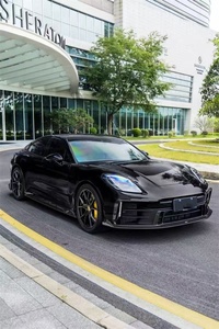 ชุดแต่งคาร์บอนไฟเบอร์สำหรับ Porsche Panamera 976 สภาพใหม่ ประกอบด้วยลิ้นกันชนหน้า ดิฟฟิวเซอร์ สปอยเลอร์ สเกิร์ตข้าง และลิ้นกันชนหน้าคาร์บอนไฟเบอร์ - Product Image 4