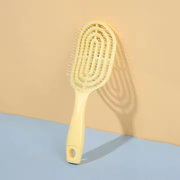 Brosse à cheveux ronde de massage du cuir chevelu bouclée mignonne de voyage personnalisée avec marque privée, massage du cuir chevelu en gros avec logo