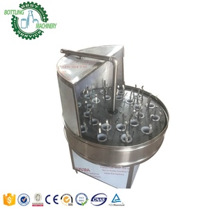 Laveuse semi-automatique rotative à 24 têtes pour bouteilles de bière et de vin, capacité 2000 bph, avec pulvérisation d'eau et chauffage - Product Image 2
