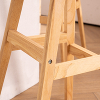 Tabouret de bar moderne nordique à hauteur de comptoir avec revêtement en cuir et dossier confortable pour bar à jus, salon de thé, îlot de cuisine