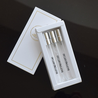 Caja de lujo personalizada para botella de perfume de vidrio de 10 ml, botella de perfume de muestra pequeña de 2 ml, 3 ml, 5 ml, 10 ml con tapa plateada y atomizador de rosca.