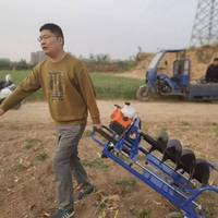 Tarière thermique portable à pousser à la main pour le forage de trous, avec moteur et composants essentiels