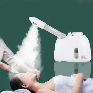 Soğuk sıcak iyonik yüz buharlaştırıcı sis püskürtücü nemlendirici profesyonel taşınabilir spa yüz buhar makinesi