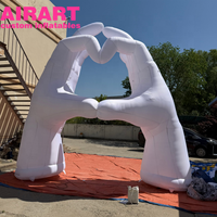 Main gonflable blanche en forme de cœur, arche gonflable en forme de main pour la décoration et l'exposition