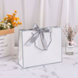 Bolsas de Regalo de Papel Kraft Mini con Logotipo Personalizado para Pequeñas Empresas y Venta Minorista de Ropa, Empaque Versátil para Uso en Venta Minorista de Alimentos - Product Image 1