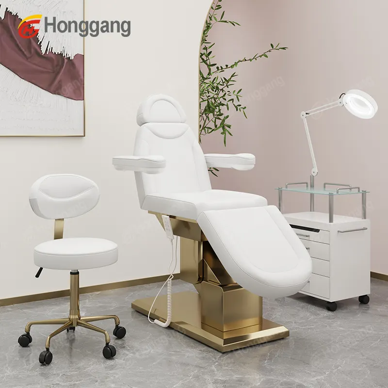 Hot selling beauty salon equipment metal golden stainless steel base electric beauty massage table with magnifying glass