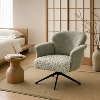Fauteuil de salon texturé avec coussin botanique, base pivotante en métal noir, hauteur réglable