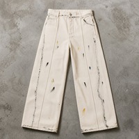 Jean de peintre vintage blanc délavé pour homme, style streetwear, avec éclaboussures de peinture colorées, coupe droite à double genouillère