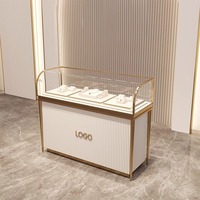 Vitrine de luxe pour bijoux et montres en acier inoxydable or argent Vitrine en verre transparent pour antiquités de jade