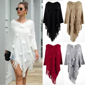 Grosir Pakaian Jalanan Mantel Panjang Rumbai Rumbai Selendang Ponco Diagonal Leher V Pompom Pullover Lembut Rajutan Mantel Sweter Wanita