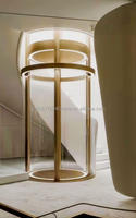 Porte d'ascenseur pliante automatique avec finitions métalliques et en verre, design moderne pour hôpital, hôtel, villa et appartement