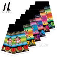 Tissu hawaïen Luau vibrant - Imprimé tropical intégral en polyester pour vêtements de villégiature et accessoires de plage
