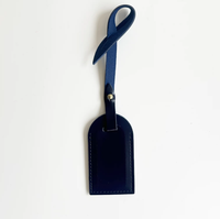 Étiquette de bagage en cuir PU lisse anti-perte pour sacs à dos et valises de voyage, accessoire de charme, vente chaude