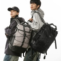 Sac à dos de voyage extérieur tendance 2025 unisexe grande capacité en nylon imperméable avec fermeture éclair pour la randonnée