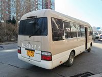 Minibus Toyota Coaster d'occasion 23 places pour le tourisme et le transport de passagers, moteur essence 2TR avec climatisation, conduite à gauche, peinture neuve