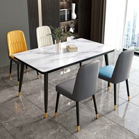 Ensemble de table à manger de luxe nordique avec structure en fer, durable et imperméable, 4 chaises pour hôtel ou restaurant