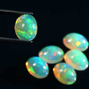 อัญมณีทรงวงรีสีเหลืองธรรมชาติทรงโอปอลอัญมณีทรงหลวมจากเอธิโอเปียนผลิตจากความร้อน - Product Image 3