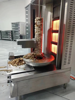 Entièrement automatique en acier inoxydable 70kg électrique/gaz Doner Robot coupe automatique Shawarma Kebab Machine