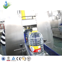 Machine de soufflage automatique de bouteilles d'eau de 10 litres, machine de remplissage d'eau pour bidon de 5 litres, machine de remplissage d'eau de 15 litres, machine d'emballage sous film rétractable