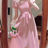 Gaun Lengan Mengembang Prancis Warna Pink Bahan Jersey Bernapas Kasual Motif Cetak Romantis Dekorasi Kancing Depan untuk Pantai Musim Panas