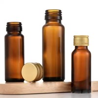 Bouteilles en verre ambré cylindriques recyclables économiques de 20 ml, 30 ml, 50 ml avec couvercle en aluminium doré