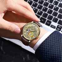 POEDAGAR 1416 Montre de sport de luxe pour hommes Montre en cuir lumineuse étanche pour hommes Montres mécaniques automatiques à tourbillon creux