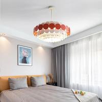 Lampe suspendue minimaliste en fer avec abat-jour en acrylique multicouche de style nordique, idéale pour restaurant et salle à manger