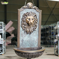 Fontaine murale de jardin extérieure en bronze antique avec tête de lion