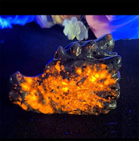 Vente en gros de pierres précieuses réactives aux UV Yooperlite naturelles Cristal Poli Tête de dragon Crânes Sculpture
