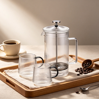 Cafetière à piston minimaliste 600 ml en verre borosilicate avec poignée colorée et filtre en acier inoxydable