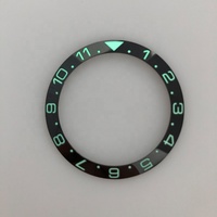 Montre 007 38 mm à double fuseau horaire noire avec insert de lunette en céramique luminescent vert et fonction inclinée