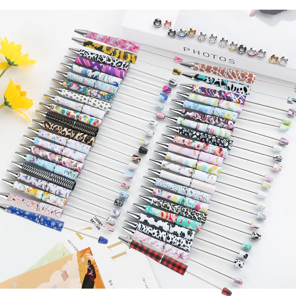 Vente en gros de perles de silicone accessoires de charme stylos à bille bruts imprimés stylos à perles personnalisés bricolage
