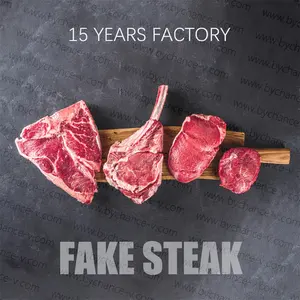 Fotografi Latar Belakang daging palsu mock up palsu sapi mentah steak tomahawk untuk dapur kulkas makanan segar bisnis tampilan iklan