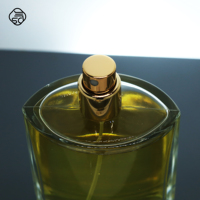 Flacon de parfum en verre transparent cylindrique vide de 80 ml avec bouchon doré à couronne et pompe pulvérisatrice à sertir, logo personnalisé