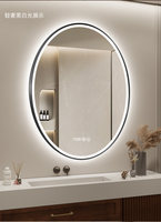 Miroir de salle de bain intelligent ovale encadré mural en verre avec éclairage LED, de luxe, pour salle de bain et coiffeuse