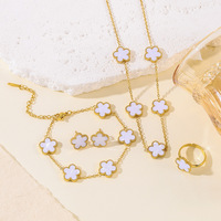 Ensemble de bijoux en acier inoxydable classique plaqué or 18 carats, collier, bracelet, boucles d'oreilles, bagues, motif trèfle à cinq feuilles, pour femme, bijoux de fête